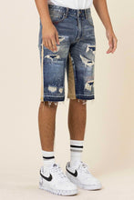 Load image into Gallery viewer, MULTI CAMO PANELED  RELEASED HEM DENIM SHORTS
